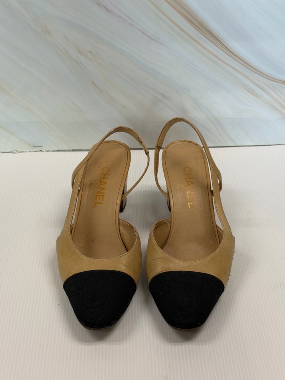 CHANEL Beige Leather Slingback Pumps with Black Cap Toe